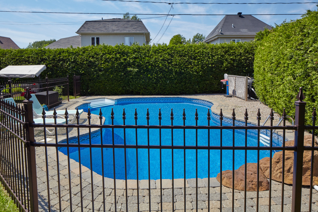 A large swimming pool at a backyard
