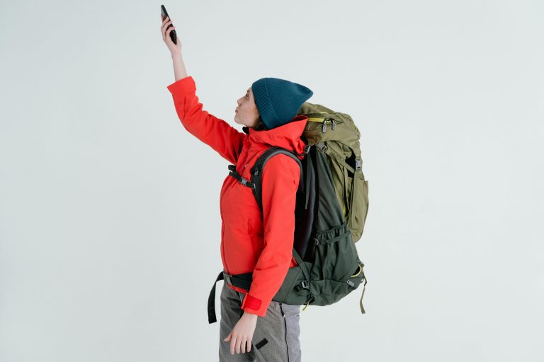 a woman looking for signal with her phone